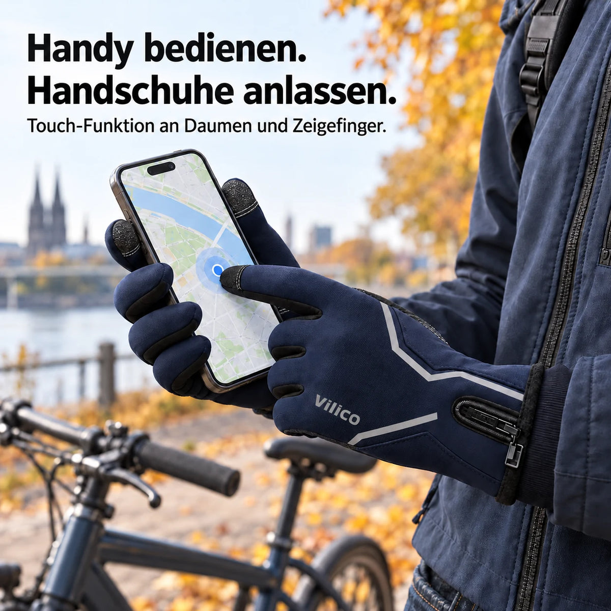 Vilico-Zeigefinger bedient ein Smartphone beim Fahrradstopp